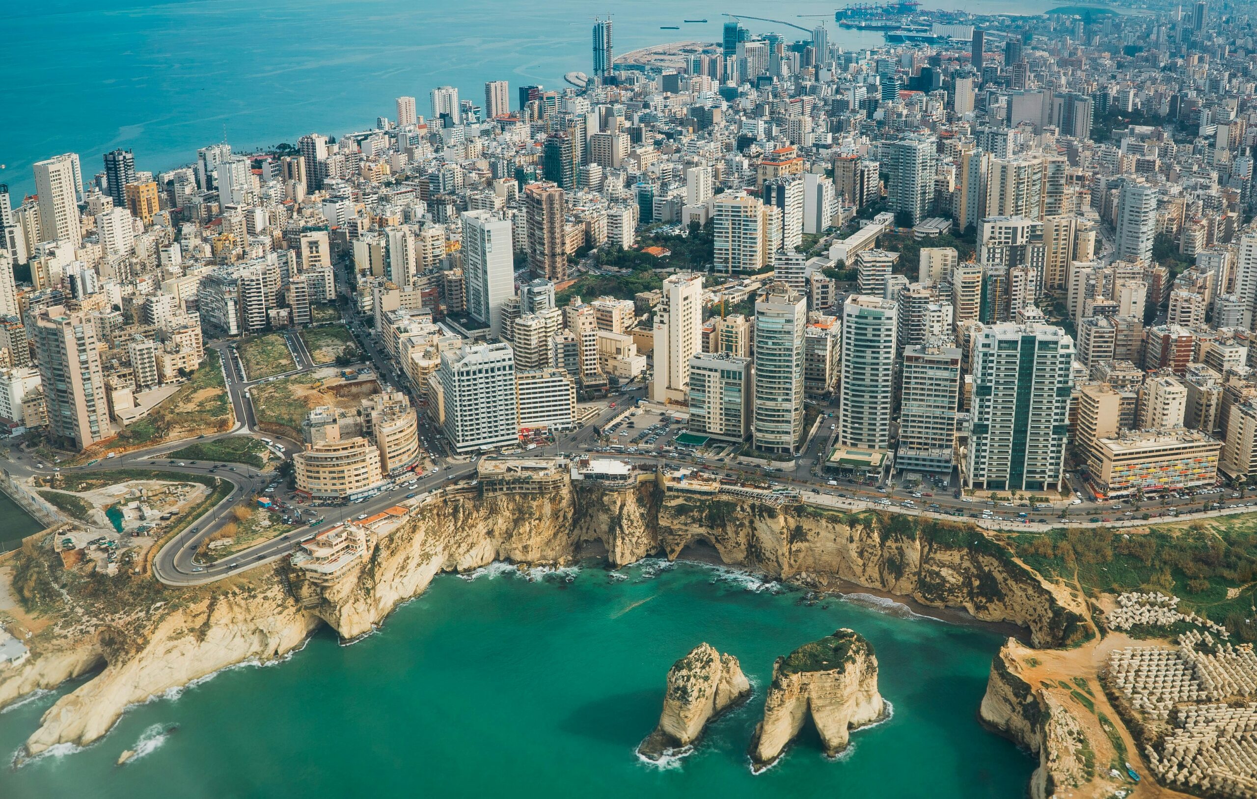 An aerial view of Beirut, Lebanon. The survey explores public opinion on governance, security, economic challenges, and regional developments. Photo by Piotr Chrobot on Unsplash.